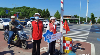 天心区：丹桂社区开展交通安全劝导活动