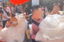 新娘回应14岁儿子抱自己出嫁 一把抱起现场画面曝光