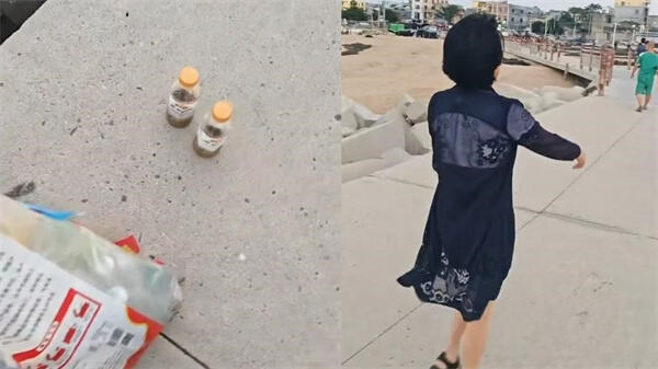 女子带大袋塑料瓶垃圾扔海里
